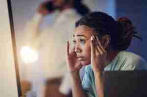 business woman struggling with anxiety in the united states